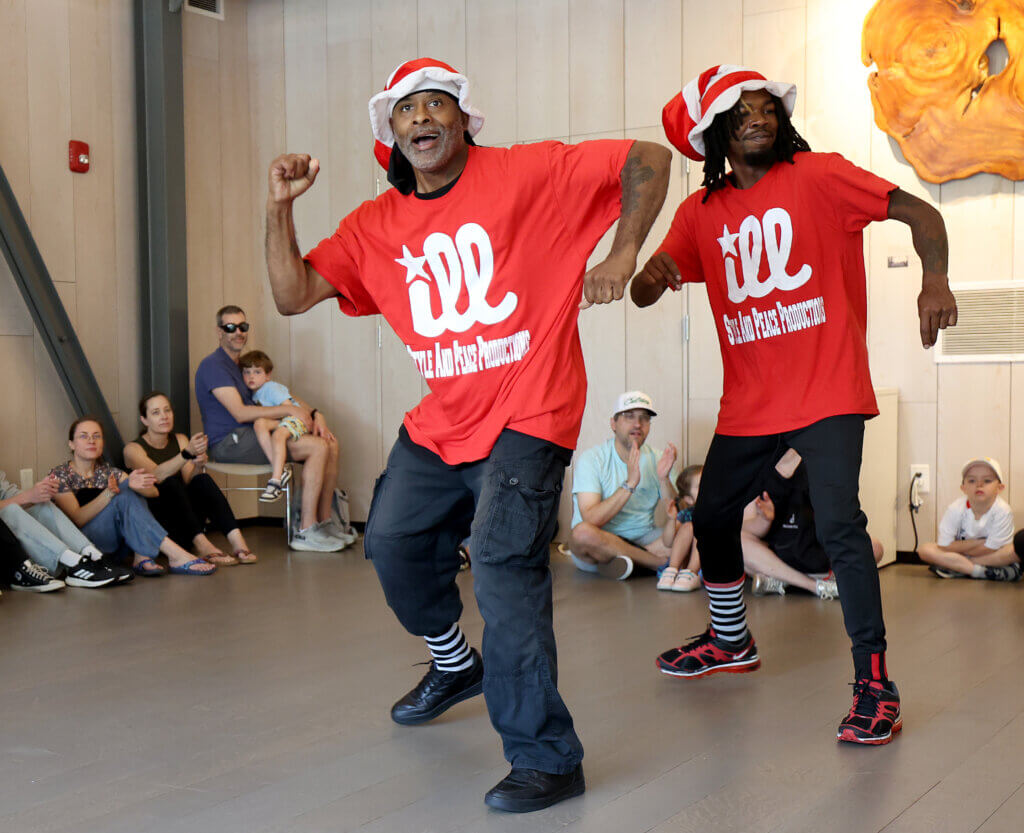 Brandon “Peace” Albright, left, and partner “Buzz” of Philadelphia-based Illstyle & Peace Productions, dance at the Acton Museum