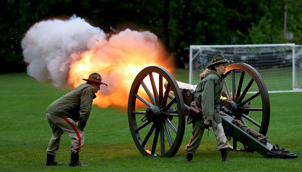 The Acton Independent Battery fires a cannon salute during Memorial Day ceremonies at Rideout Park. Ken McGagh/The Acton Bridge 
