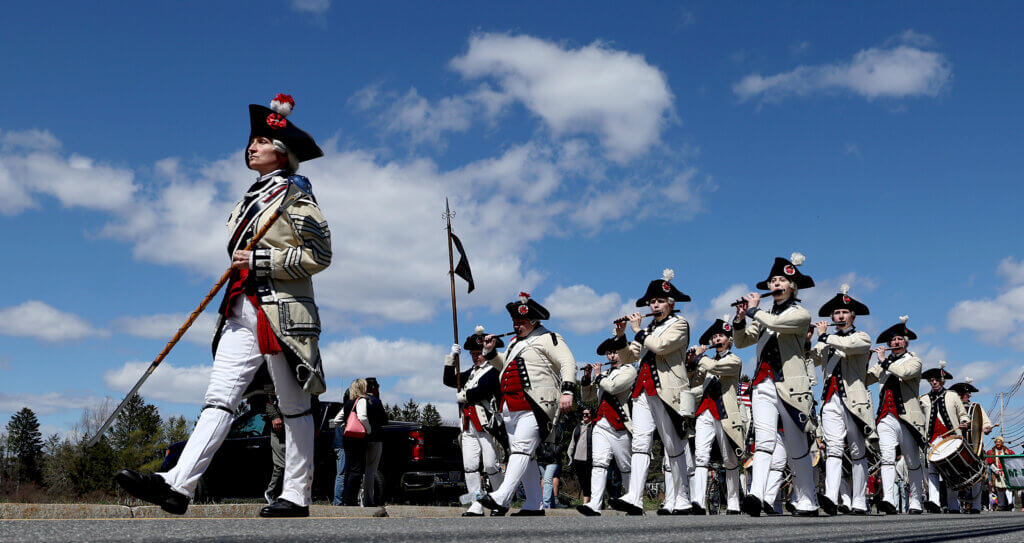 The Middlesex County Volunteers Fifes & Drums march down Old Bedford Road.
