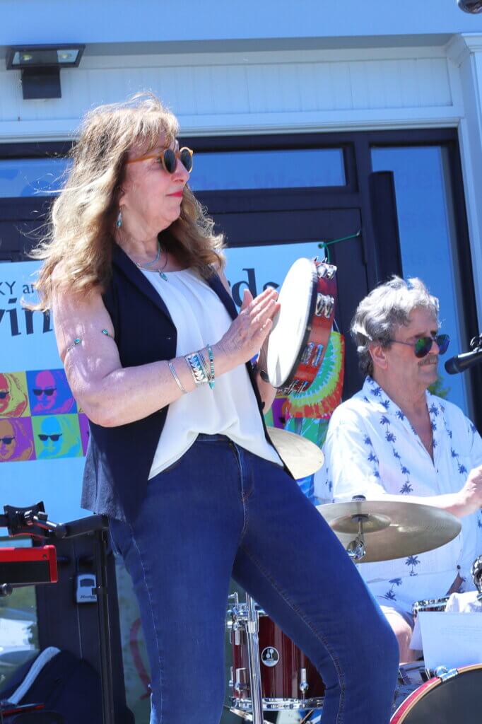 Becky Lynch of Becky and The Swingin’ Bards serenades Spring Into West Acton Day attendees. Photo: Trace Salzbrenner/The Acton Bridge