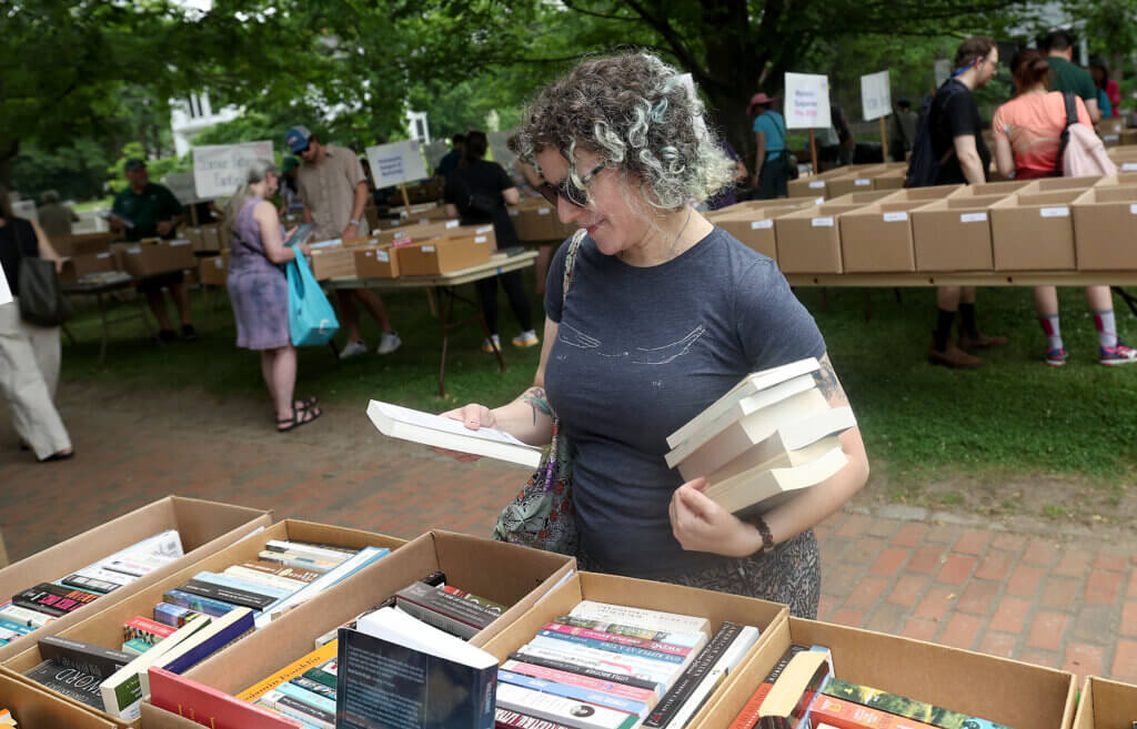 Rachel Ropeik of Acton considers adding another volume to her haul.