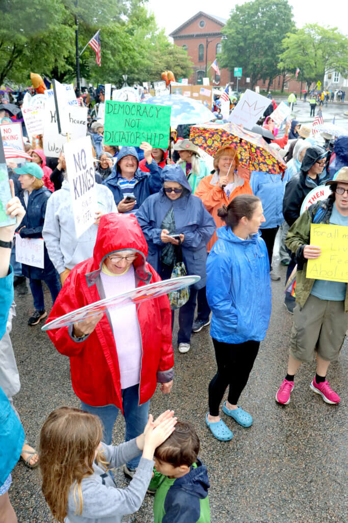 Protesters block roads in Acton Center.