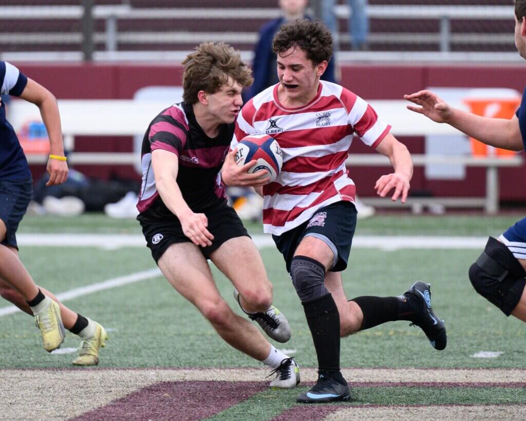 The Patriots’ Simon Ricci Nash charges upfield. Photo by Jon Straggas