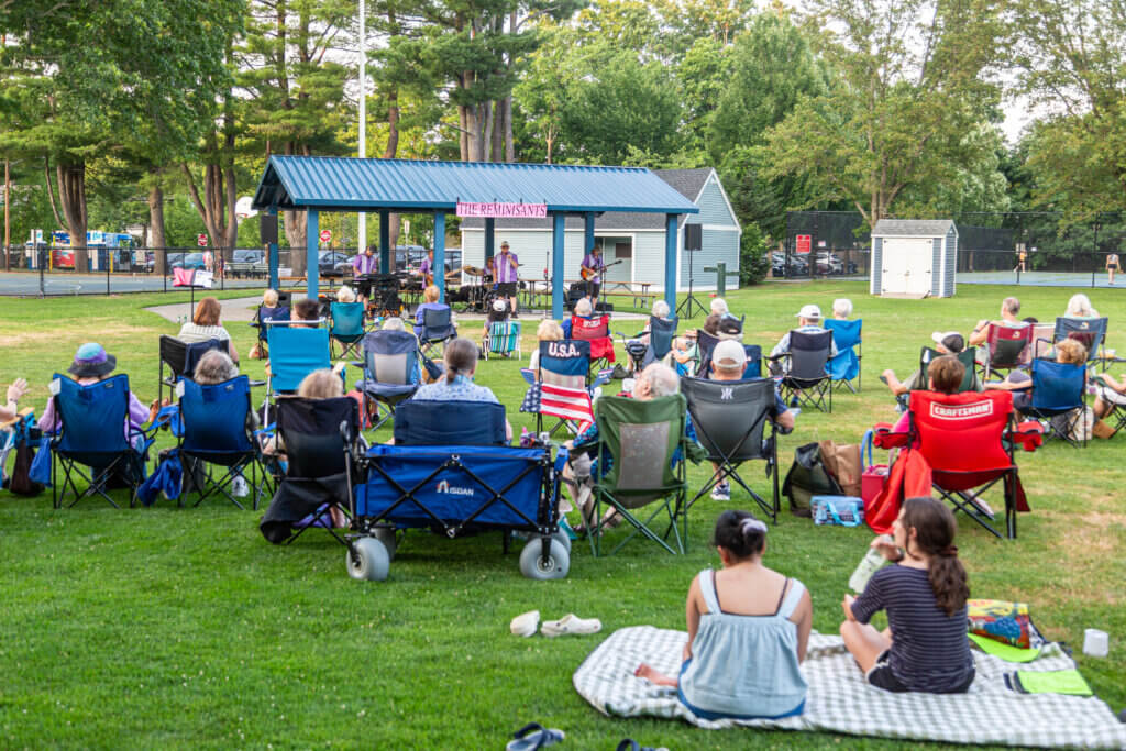 The crowd settles in with folding chairs, blankets, and provisions. Photo: Stephen Beyer/The Acton Bridge