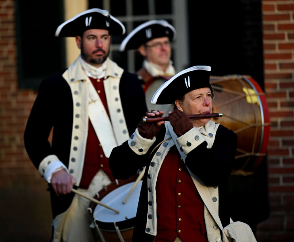 The Acton Minute Men Fife and Drum Corps performs during the lantern lighting ceremony. Photo: Ken McGagh/The Acton Bridge