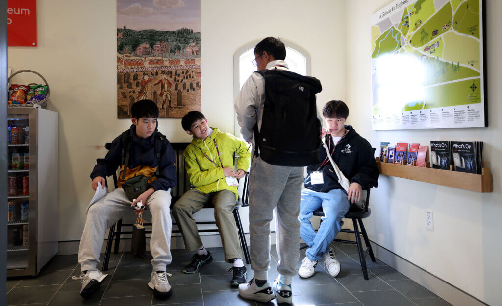 Nanae students (from left) Daiki Iriyama, Outa Kitamura and Hinata Nihonyanagi relax during a visit to the Acton Museum on Tuesday, October 28, 2025. Ken McGagh/The Acton Bridge