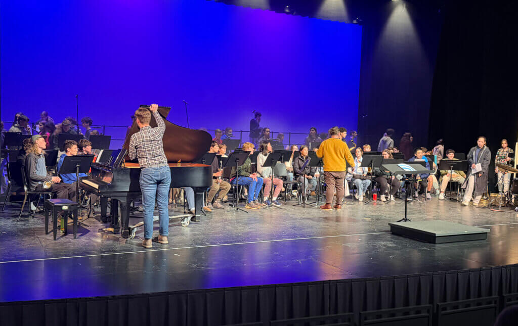 The CCHS Wind Ensemble and Combined Chorus rehearses "Meridian." Photo by Sophie Hong