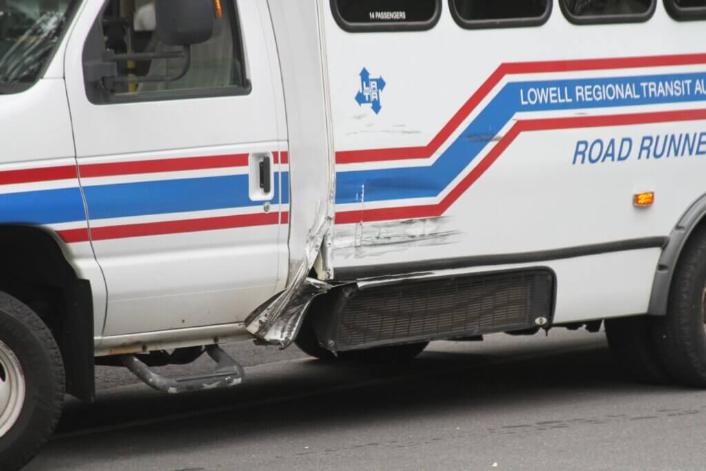 A crash left an LRTA bus with scrapes and dents on Laws Brook Road Monday. Photo: Dakota Antelman/The Acton Bridge