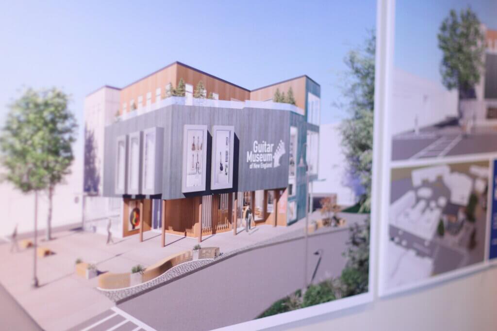 Visitors to the pop-up exhibit can also look at designs for the upcoming permanent Guitar Museum of New England. Photo: Trace Salzbrenner/The Acton Bridge