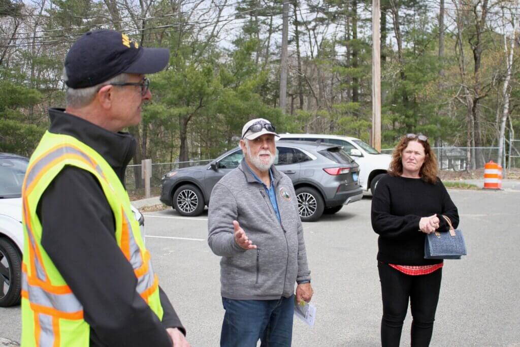 Select Board Member Paul Boehm, center, has termed himself an “ambassador” for 2229 Main Street and organized a recent tour. Photo: Dakota Antelman/The Acton Bridge