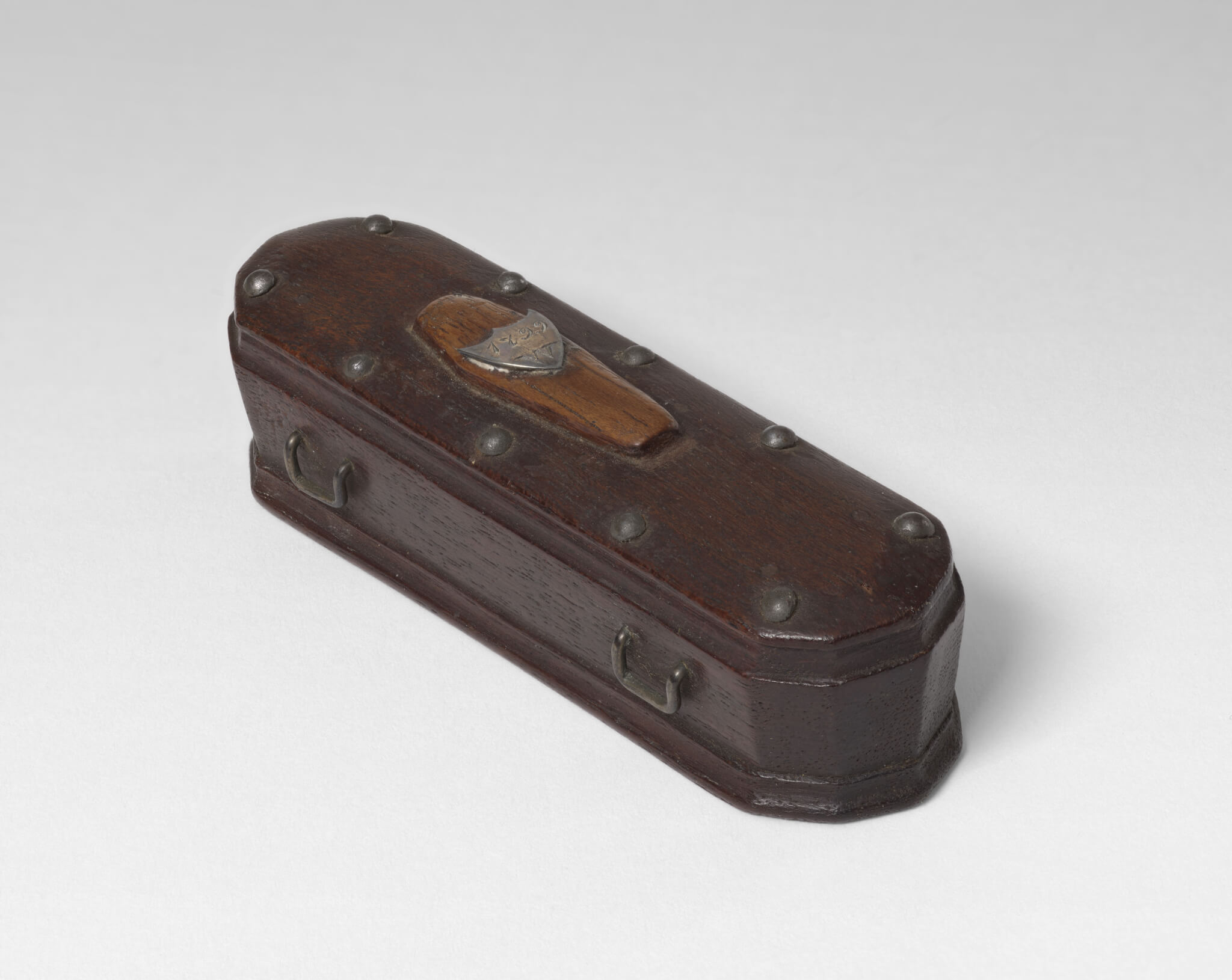 A 19th-century miniature coffin that incorporates an original piece of George Washington’s mahogany coffin as part of Revolutionary Legacies. Photo courtesy of the Acton Museum