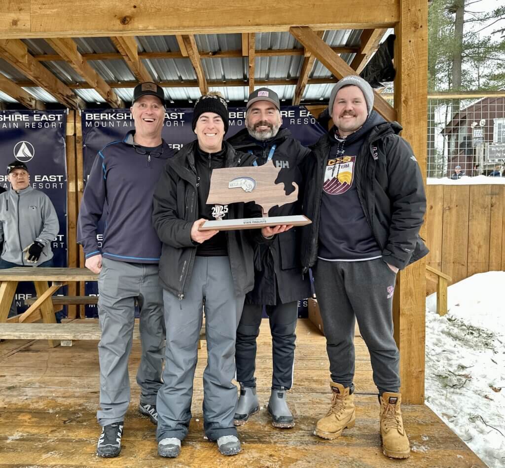 The CCHS coaching staff at States in February 2025: from left, Andrew Callen, Amy Brooks, Burton Flint, and Greg Marshall. Courtesy photo