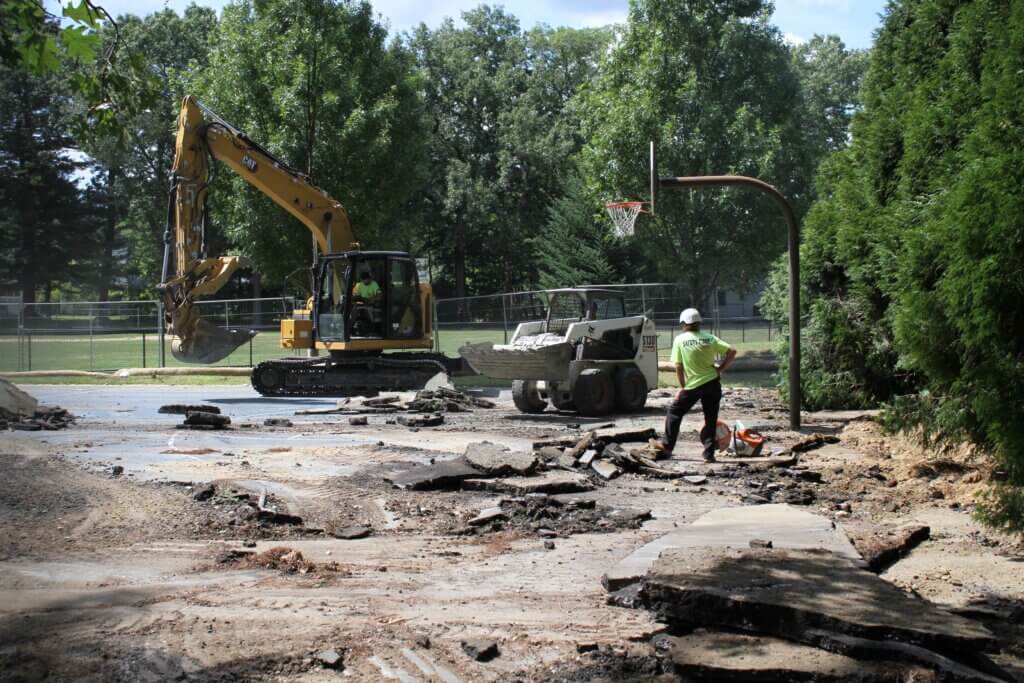 Crews tear up the Rideout Park basketball courts. Photo: Dakota Antelman/The Acton Bridge