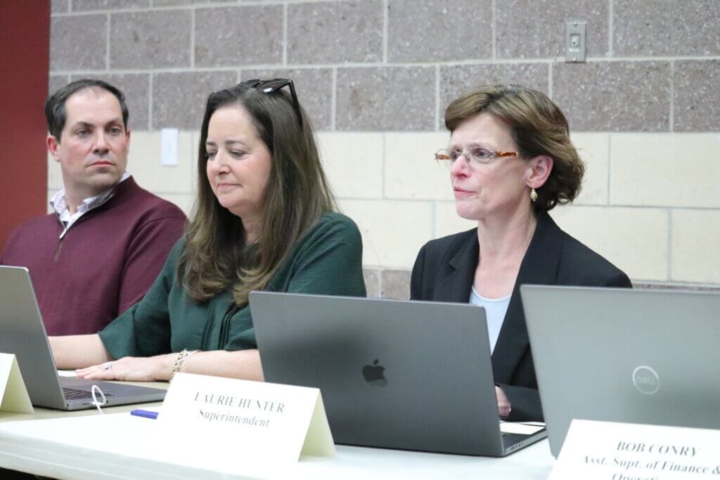 Schools Superintendent Laurie Hunter and Regional School Committee Chair Tracey Marano listen as students give updates. Photo: Trace Salzbrenner/The Acton Bridge