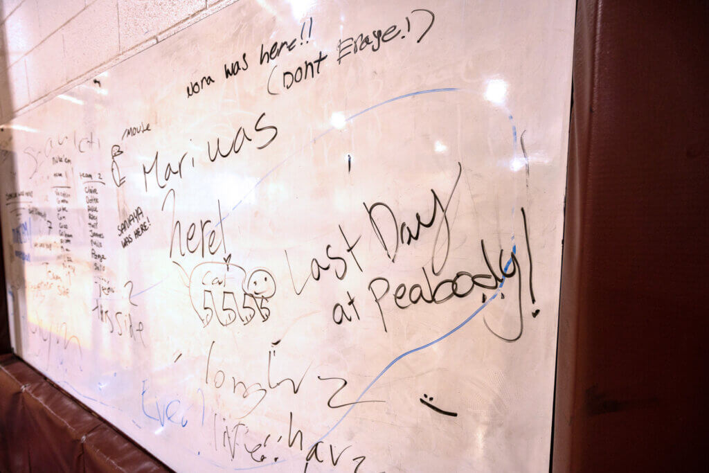 Students left messages on a whiteboard in the Peabody school gym. Photo: Stephen Beyer/The Acton Bridge