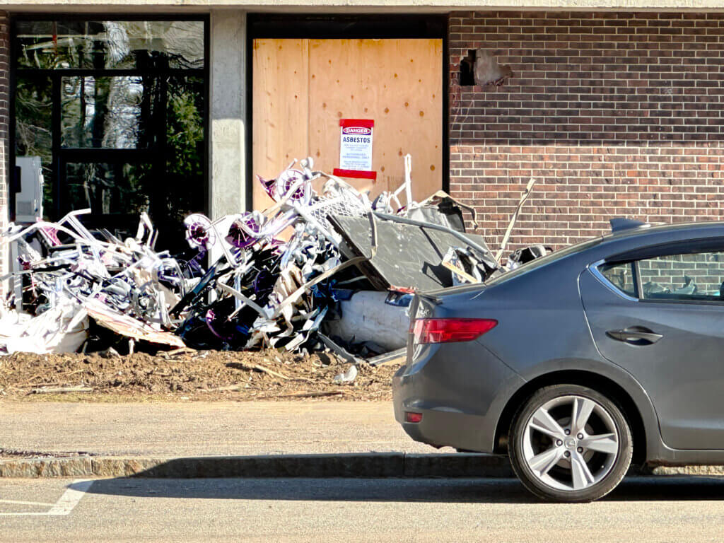 A sign at Sanborn warns of asbestos. Photo by Laura Hayes
