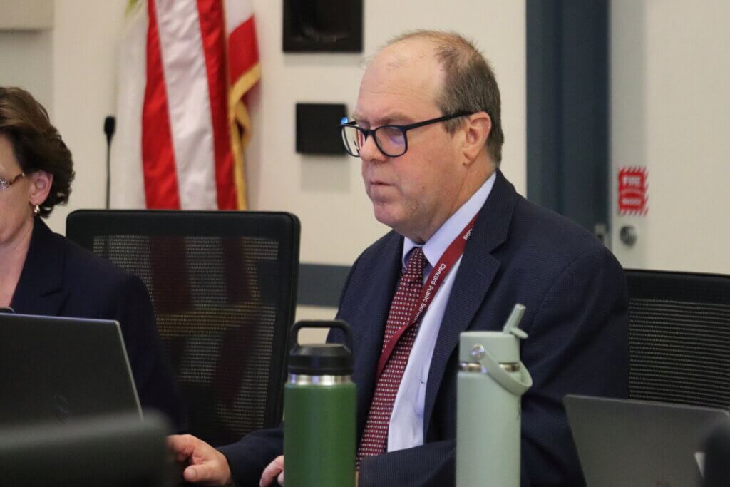 Robert Conry, assistant superintendent of finance and operations, explains the budget to the School Committee on January 7. Photo: Trace Salzbrenner/The Acton Bridge