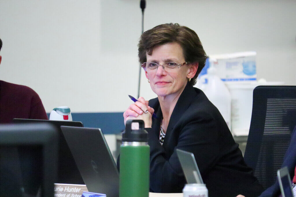Superintendent Laurie Hunter listens while the Acton Carlisle High School principals speak over Zoom. Photo: Trace Salzbrenner/The Acton Bridge