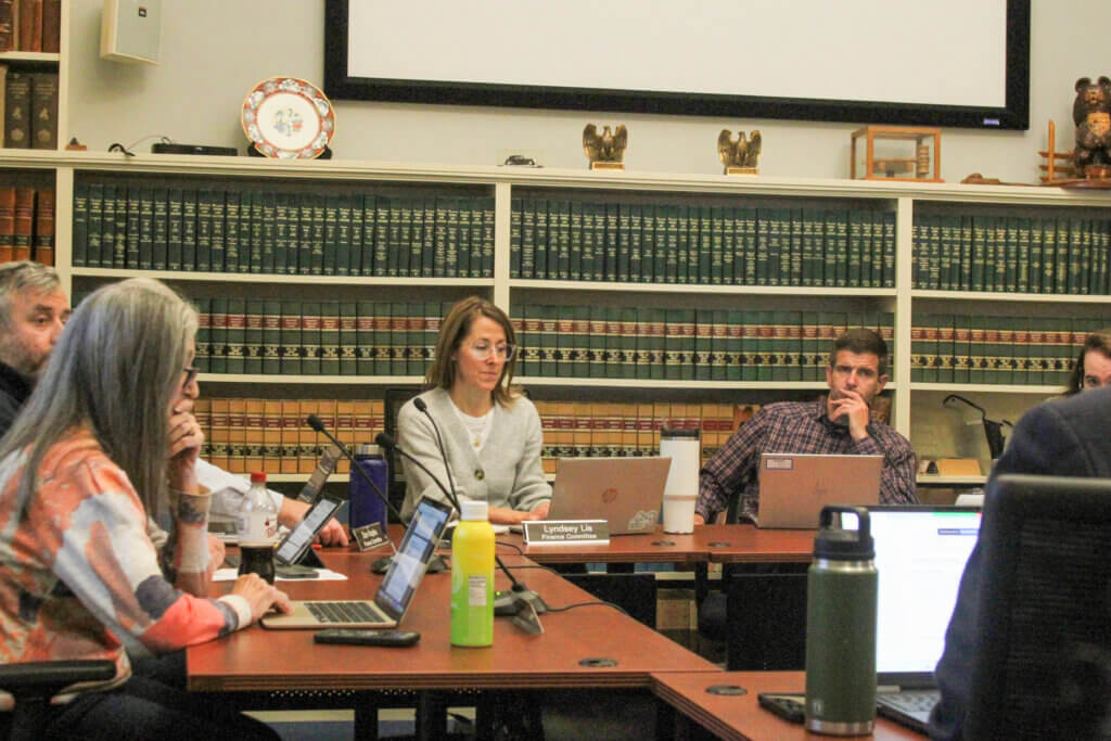 Finance Committee members listen during a school budget presentation. Photo: Dakota Antelman/The Acton Bridge
