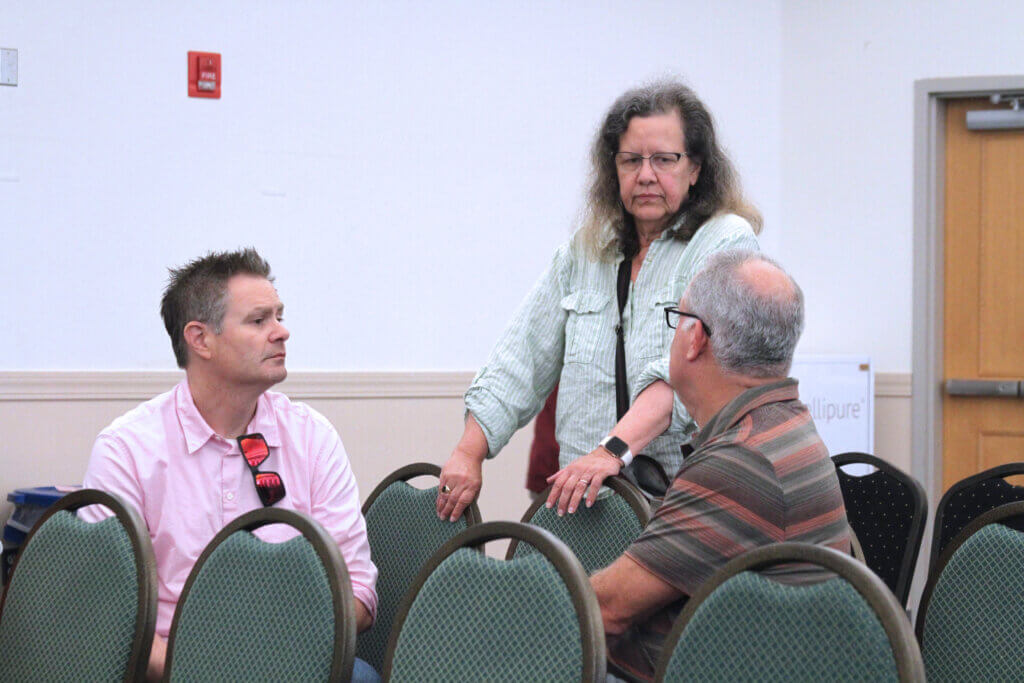 Parents Marc Girolimetti, left, and Brian Farber, right, and recent School Committee member Cynthia Rainey have all criticized school leaders for their handling of antisemitism incidents. Photo: Dakota Antelman/The Acton Bridge