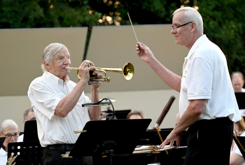 Rich Given performs a trumpet solo as musical director Jim O’Dell conducts. Photo: Ken McGagh/The Acton Bridge