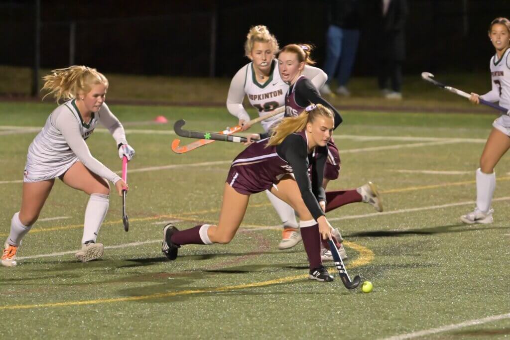 Scarlett Mirak, with Julia Reynolds behind her, on the attack. Photo by David Clancy