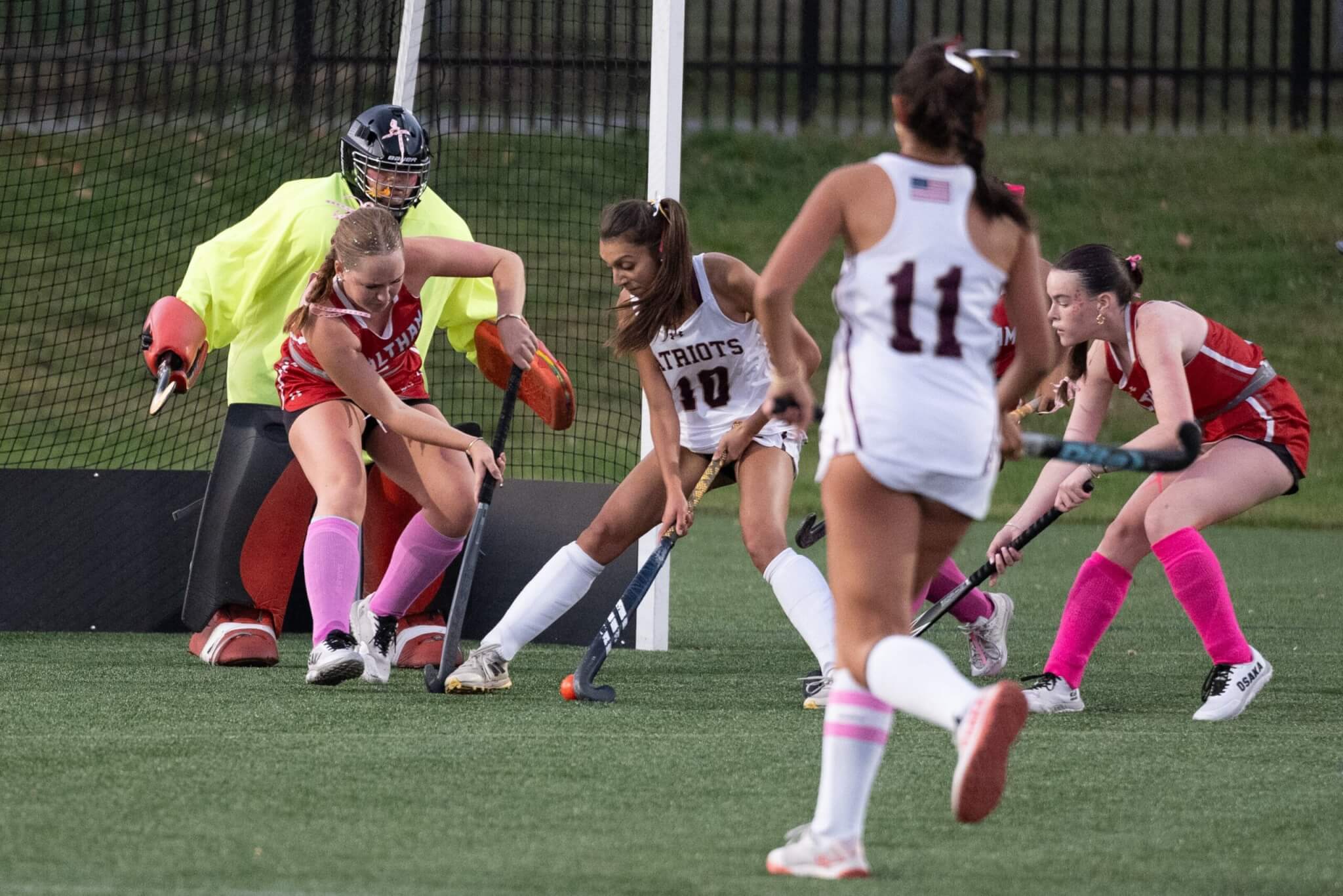 Sophia Arif attacks the Hawks' net, with co-captain Kaia Triola in support. Photo by David Clancy