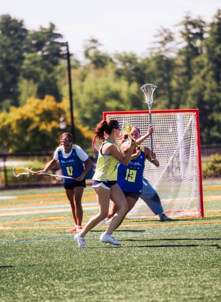 Acton-Carlisle’s Vivi Myles (center) takes a shot for Brazil in a scrimmage against Armenia. Photo by Elijah Soh