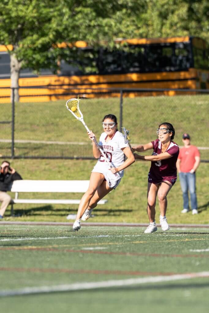 Vivi Myles on her way to scoring one of her three goals against Belmont on Monday. Photo by Aidan Moroney