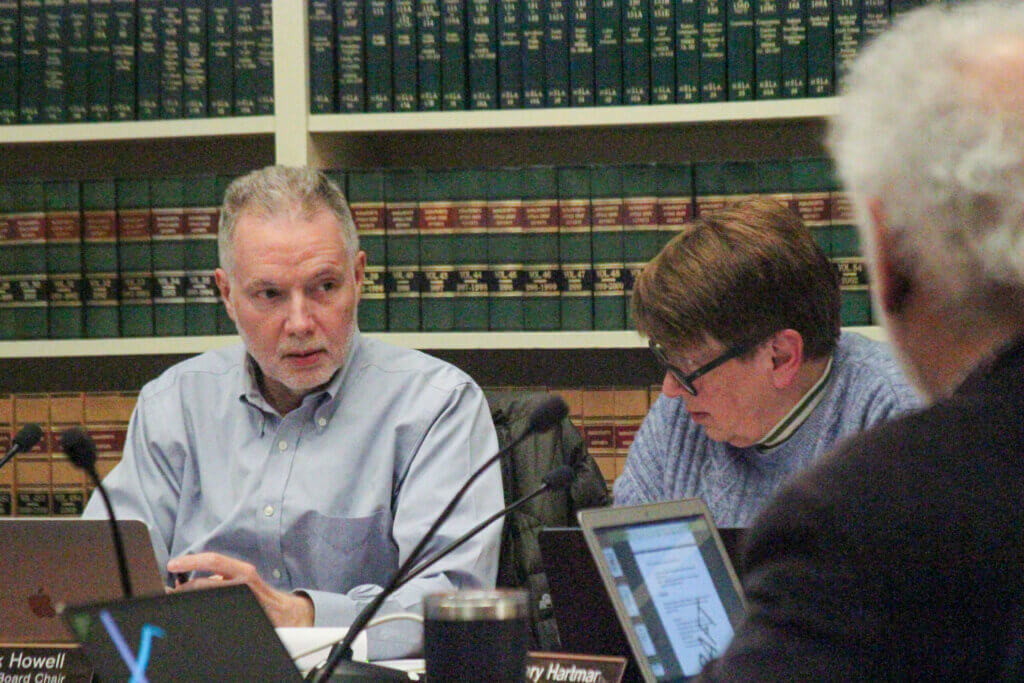 Select Board Chair Mark Howell, left, was among those who backed Banfield’s revised solar requirement proposal after weeks of discussion in town board and committee meetings. Photo: Dakota Antelman/The Acton Bridge