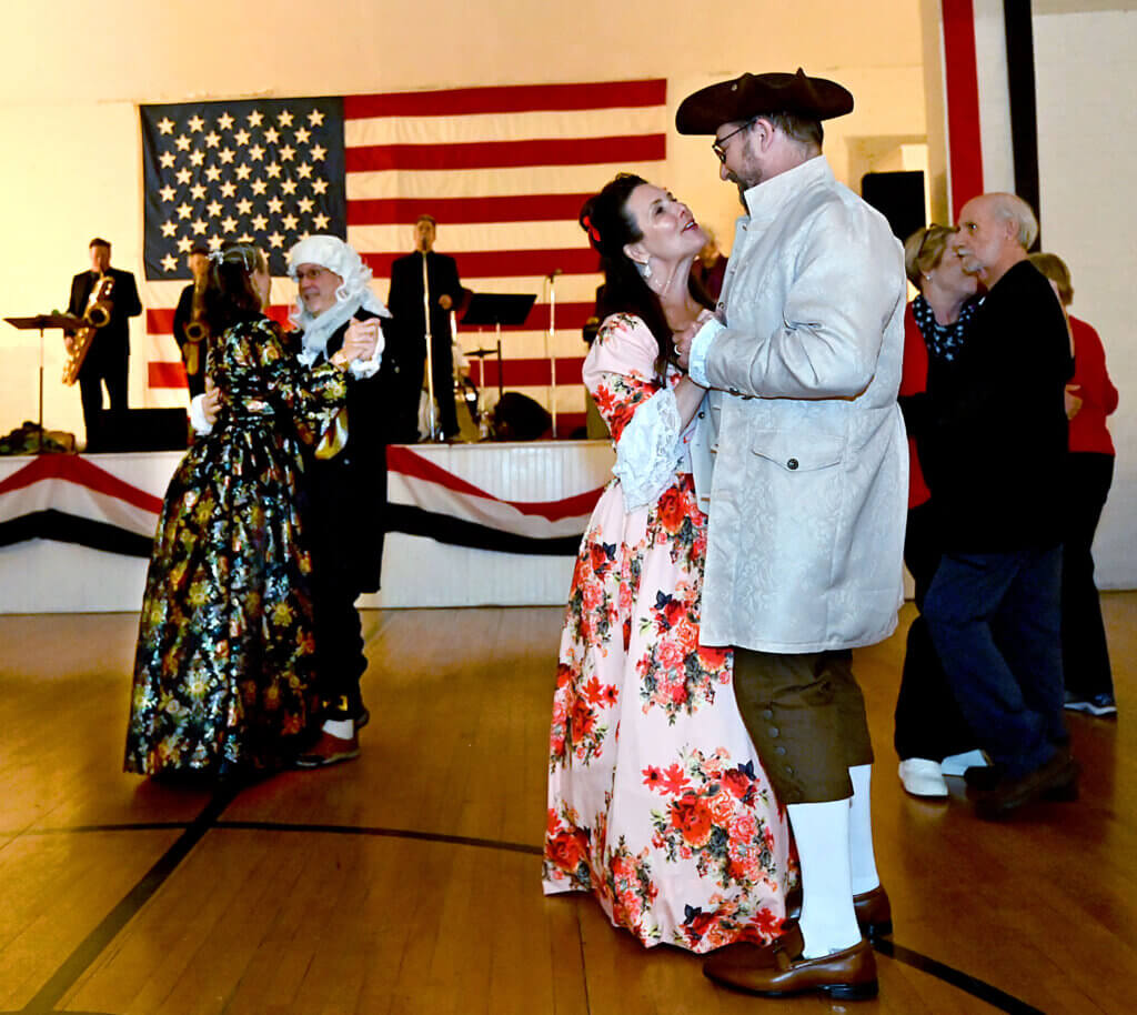 Jay Ragusa and Andrea Fontaine of Ayer dance to the band the Love Dogs during the 2025 Patriots Ball at the Acton Armory on Saturday, April 12, 2025. Ken McGagh/The Acton Bridge