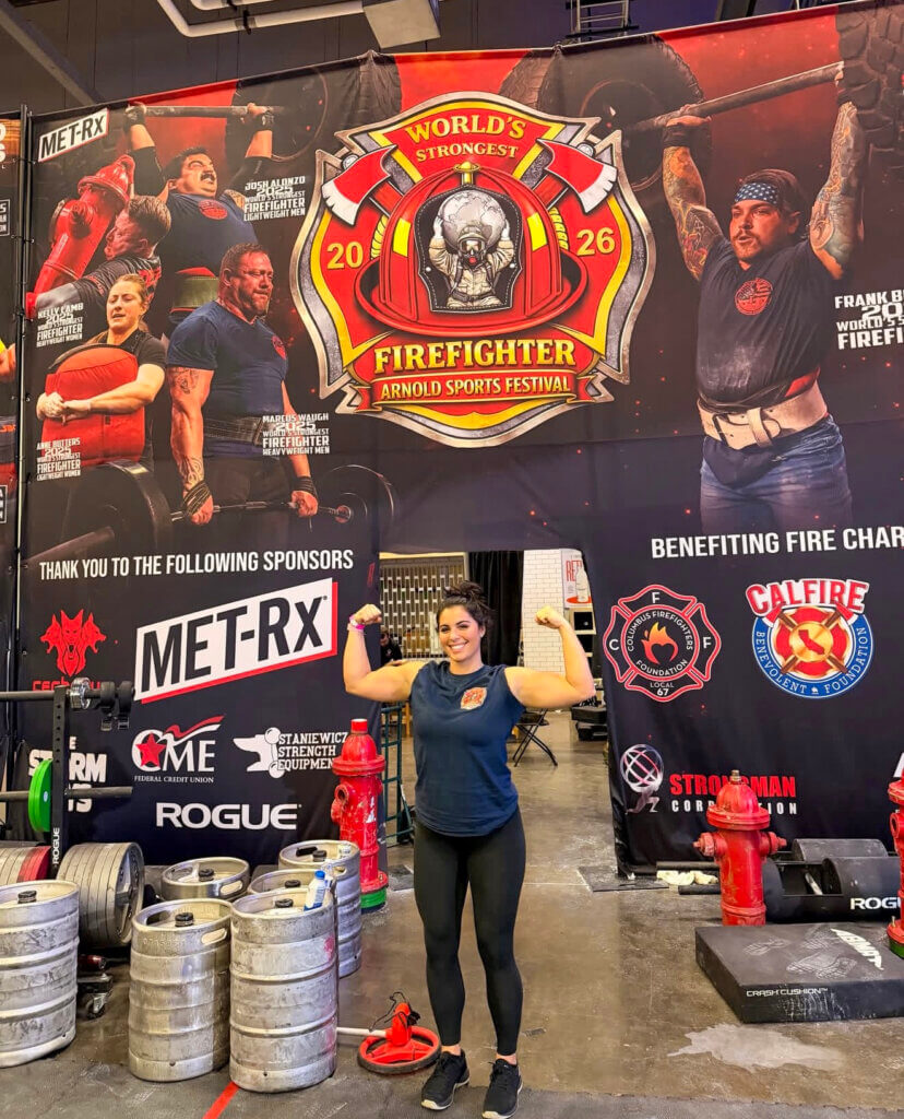 Samantha Hamilton flexes her biceps at the World’s Strongest Firefighter competition at the Arnold Sports Festival in Columbus, Ohio. Courtesy photo