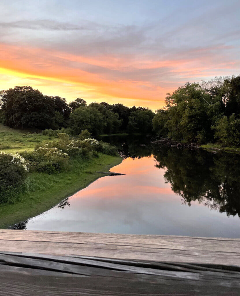 “Sunset: Acton River” by Acton artist Benet is in “The Rivers of Acton” exhibit at the Fowler Library. Courtesy photo.