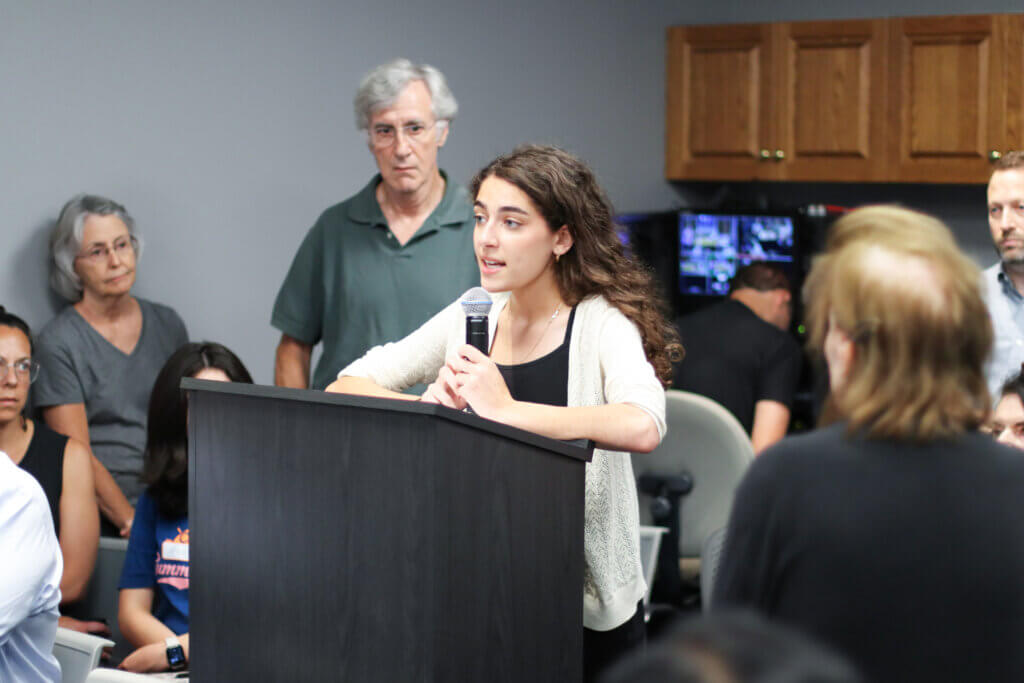 Recent CCHS graduate Stella Kaplowitz drew gasps from the audience at Monday’s Select Board meeting as she described antisemitic incidents at the high school. Photo: Trace Salzbrenner/The Acton Bridge