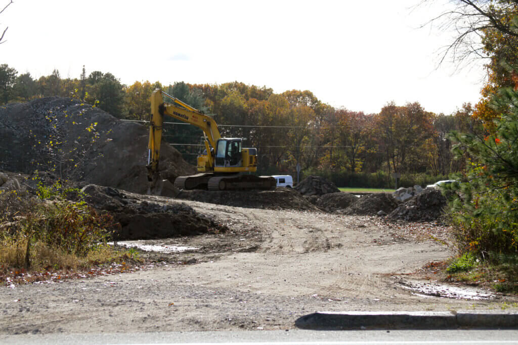 Construction equipment still dotted a staging site beside Route 2 after the town gave a contractor a November 15 deadline to leave. Photo: Dakota Antelman/The Acton Bridge