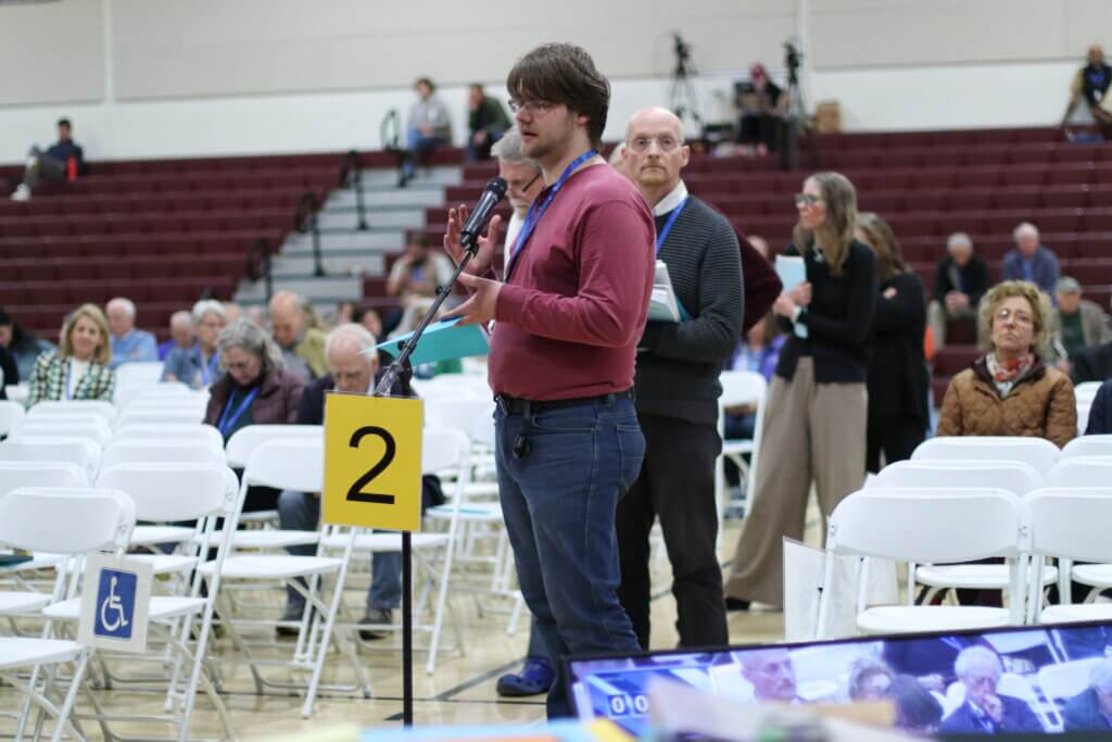 Town Meeting voters continued to line up to speak on wireless siting as the clock ticked toward 10:30 p.m. Photo: Trace Salzbrenner/The Acton Bridge