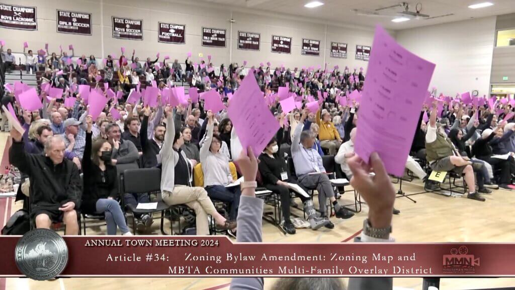 Town Meeting voters in action. Image via Minuteman Media Network