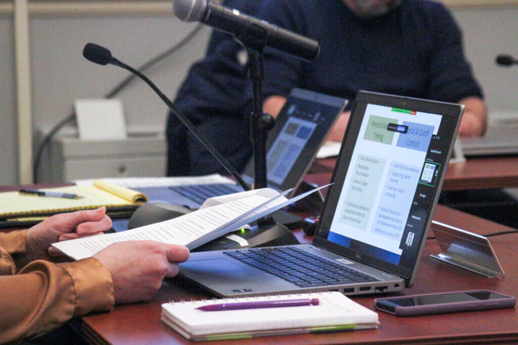 Chief Financial Officer Jennifer Barrett brought notes to augment her January 29 presentation to the Finance Committee. Photo: Dakota Antelman/The Acton Bridge