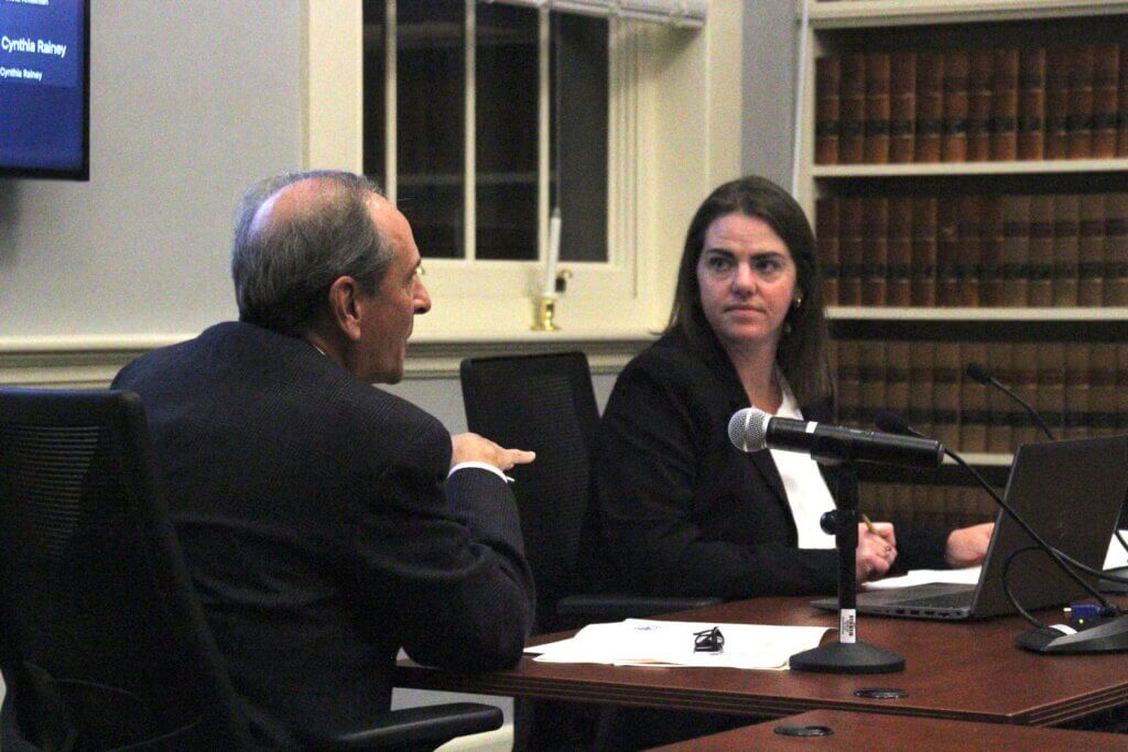 Deputy Town Manager Megan Zammuto, right, listens as town-contracted consultant Ivan Page discusses cell infrastructure. Photo: Dakota Antelman/The Acton Bridge