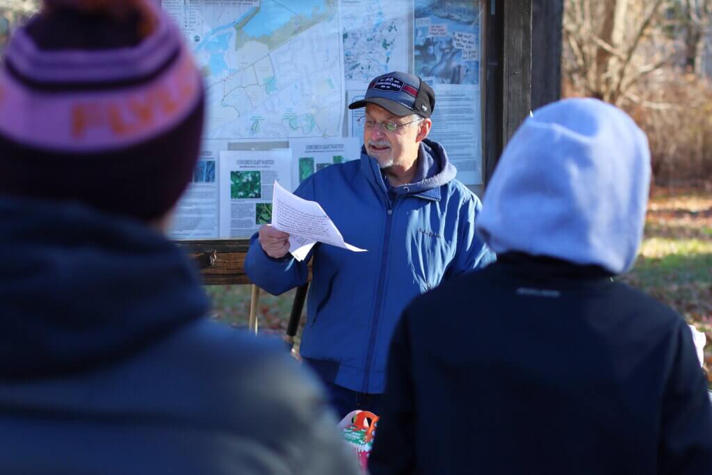Phil Posner gives a short history lesson on the Reformatory Branch Trail before the cleaning begins. Photo: Trace Salzbrenner/The Acton Bridge