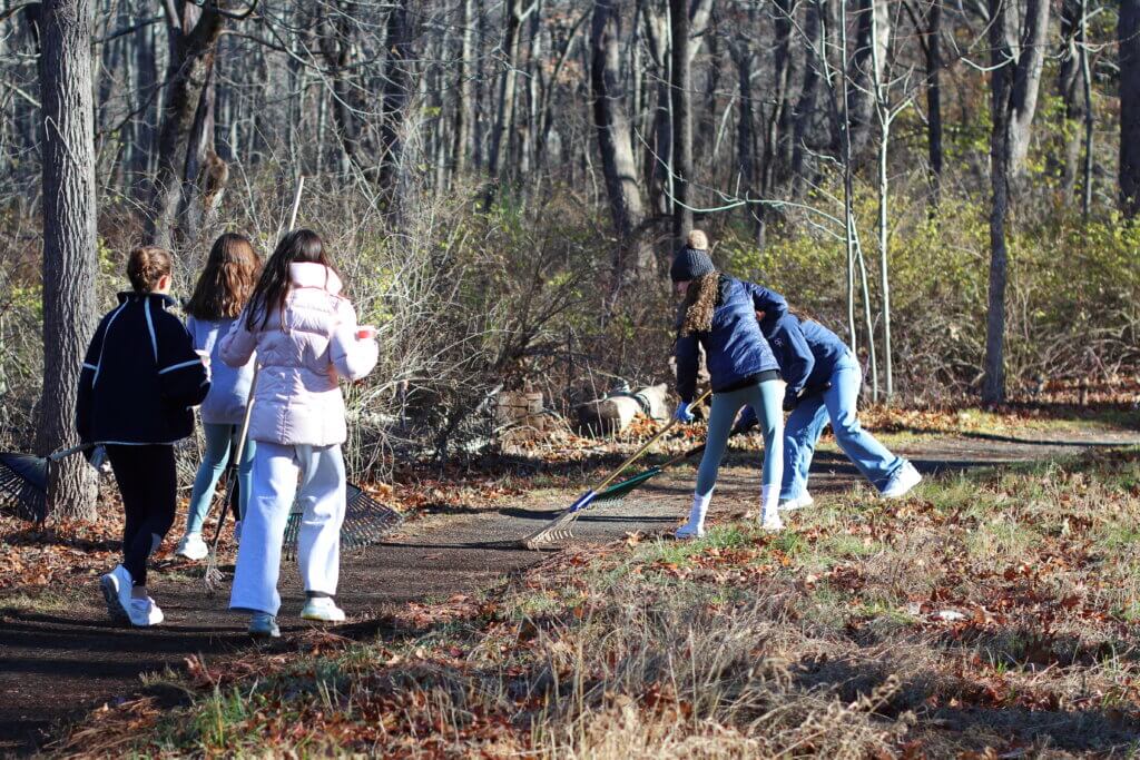 Acton middle schoolers make their way towards Bedford, clearing the path as they go. Photo: Trace Salzbrenner/The Acton Bridge