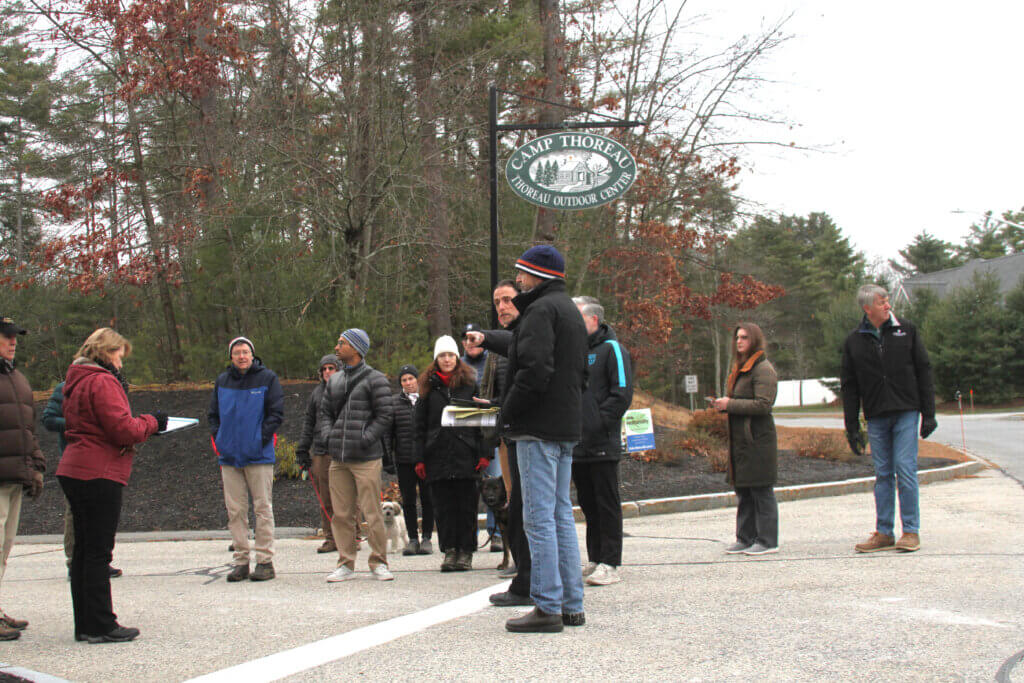 Zoning Board of Appeals members gather with developers and abutters during a December 3 site visit for the proposed Residences at Thoreau. Photo: Dakota Antelman/The Acton Bridge