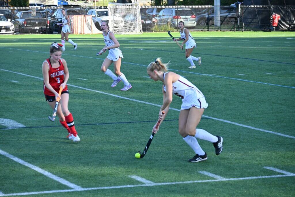 Scarlett Mirak maneuvers upfield against Reading. Photo by David Clancy