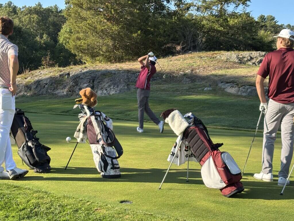 Captain Ahrinn Desai stripes one down the middle from the eighth tee. Photo by Carl Sweeney
