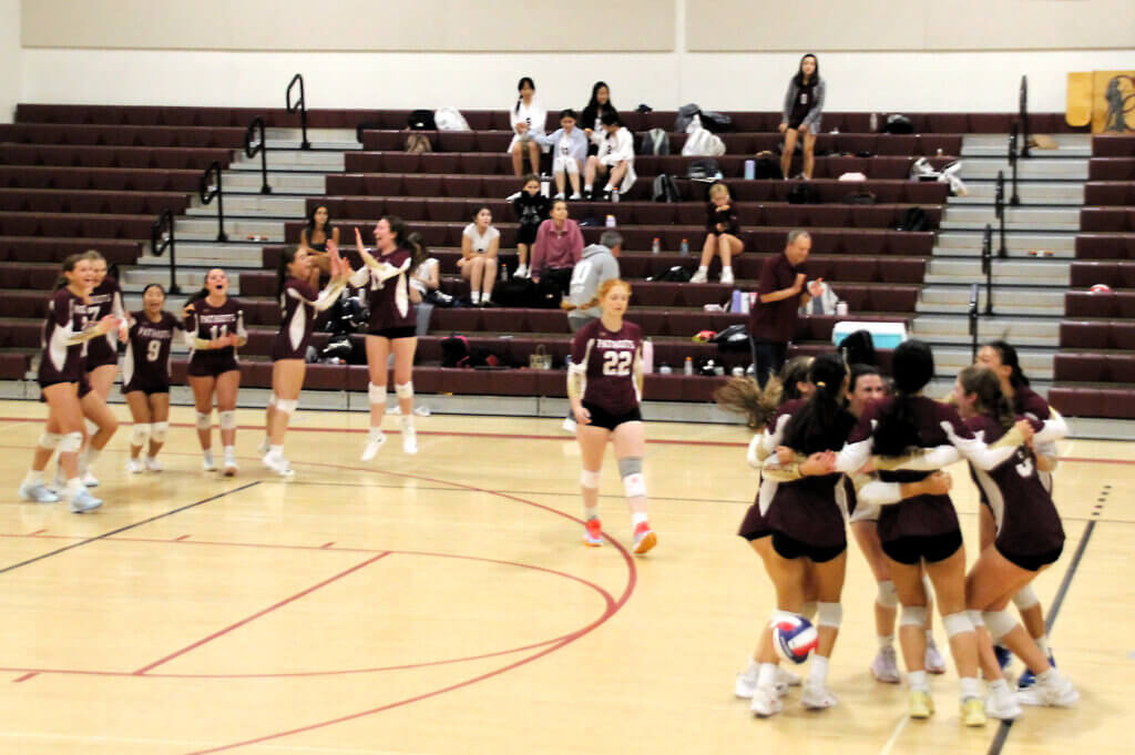 CCVB celebrates their 5 set come from behind win against Belmont. Photo by Debra Antonangeli