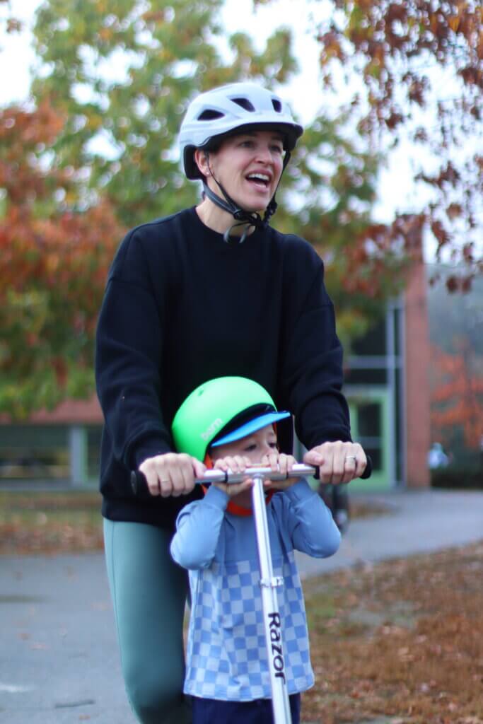 Amy Kurtis and Brody Kurtis, 3, ride to Willard Elementary School on a scooter. Photo: Trace Salzbrenner/The Acton Bridge