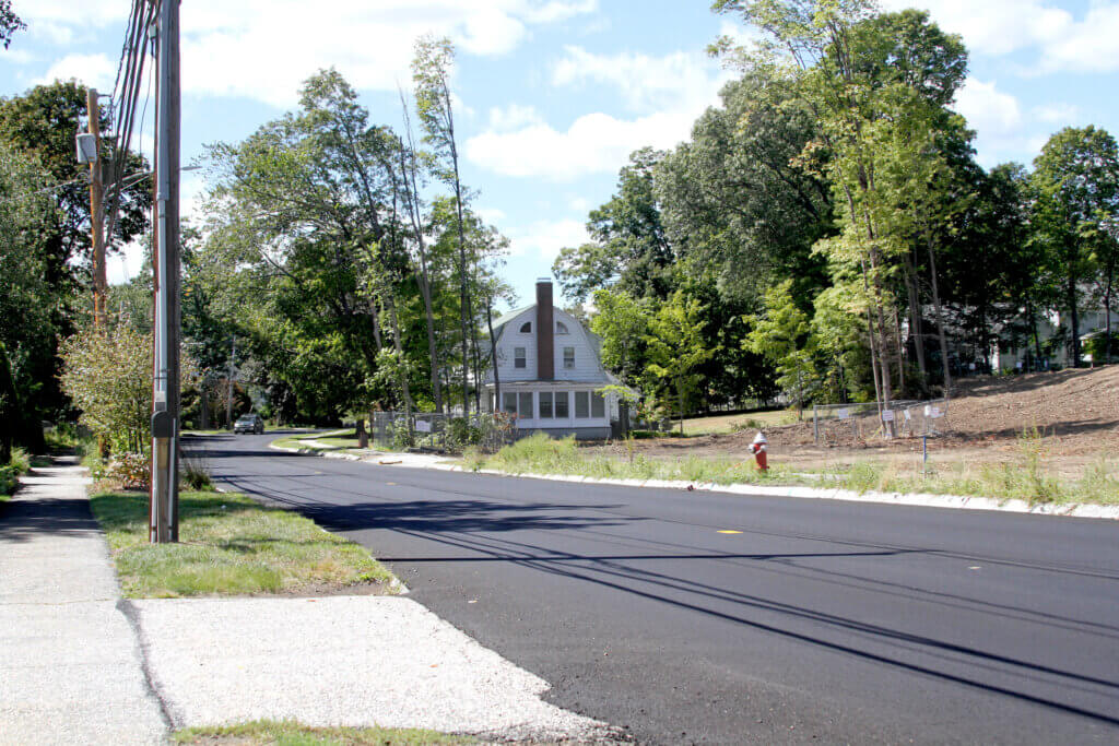 An updated view from last week shows the now barren parcel where Symes Development & Permitting plans to build a batch of market rate homes. Photo: Dakota Antelman/The Acton Bridge